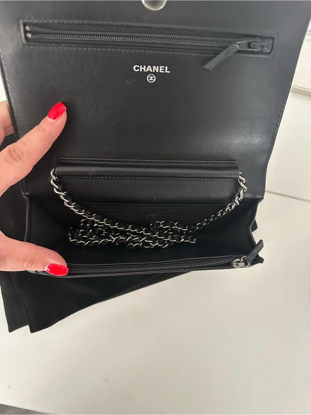 CHANEL Black Leather Clutch with Mixed Metal Chain Script